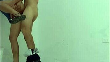 Hospital cleaner seduces nurse, puts on condom, and fucks her like a slut standing in office hallways.