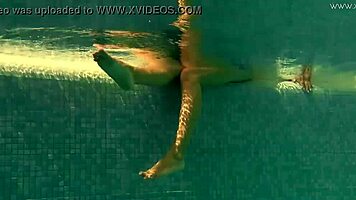 Irina's tight pussy gets wet in pool