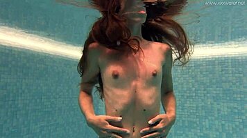 Irina's tight pussy gets wet in pool
