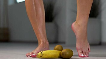 Petite Brunette Smashes Fruit with Sexy High Heels
