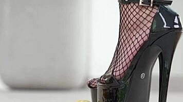 Petite Brunette Smashes Fruit with Sexy High Heels