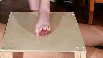Watch domina stomp cock with bare feet! Footjob madness!