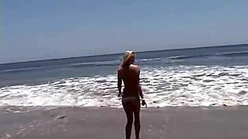 want to see this little blonde showing her natural tits and pussy at the beach?