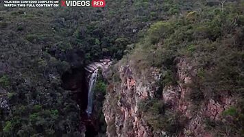 We caught this german brunette riding a muscular guy in a waterfall.