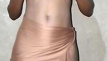 Petite african girl shows her small tits and black pussy