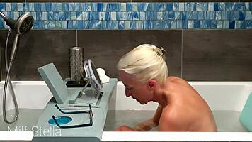 Stella indulges in a soothing bath with intimate shaving rituals
