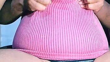 Indian housewife with natural curves relaxes at home