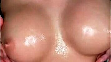 a petite college girl with tattoos flexes her big tits and ass in solo pov