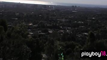 Lisa Seiffert poses naked outdoors with ripped clothes.