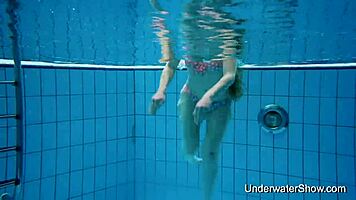 Sexy young girl reveals stunning body in underwater display