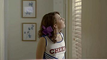 The petite cheerleader harley attempts an intriguing split pose.