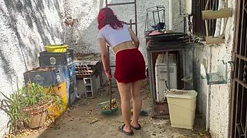 my stepdaughter cleaning the yard in a skirt, her ass is so tempting