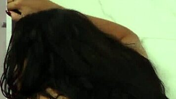 Curvy Latina with big tits drilled by black lesbian using strapon