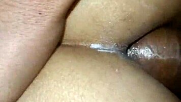Beautiful Indian girl experiences intense anal sex with boyfriend in bedroom. Screaming echoes through homemade video.