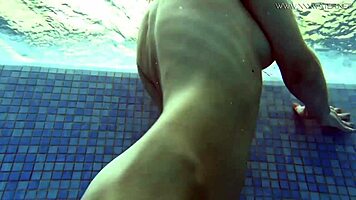 Watch Lina Mercury Tease in Red Lingerie Underwater