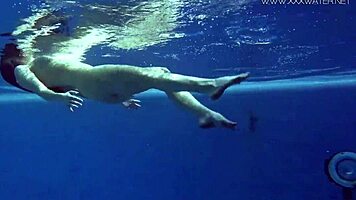 Watch Lina Mercury Tease in Red Lingerie Underwater