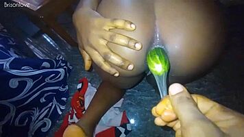 This young girl is training her ass to take a massive black cock.