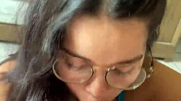 Nerdy brunette with natural tits and brown eyes gives deep blowjob to Wellington Prado's big cock in jeans shorts