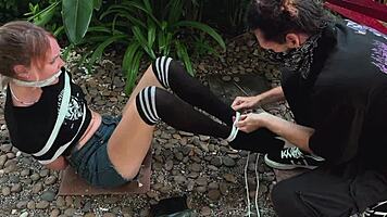 How should I punish her? By tickling those sexy bound feet?