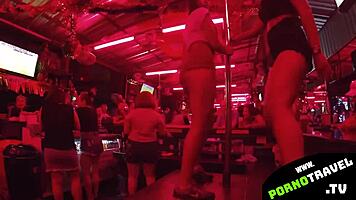 Horny petite 18+ brunette shakes ass at bar in sneakers for group swingers