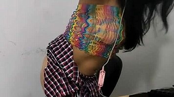 beautiful latina woman riding a pink dildo on camera