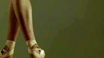 Blonde gymnast just casually showing off moves in a naked workout.