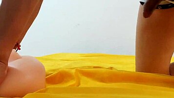 Young man fucks sex doll with big carrot