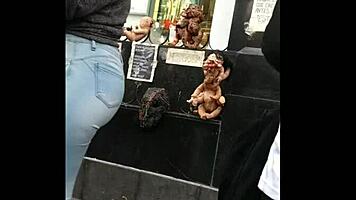 teen latina with tight jeans showing off her curves in a voyeur scene