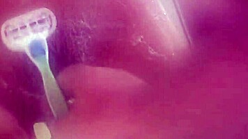 Shaving my wet pussy for you while bathing, it's so smooth and ready