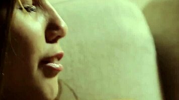 muffling her screams with a ballgag while she dildos her wet pussy!