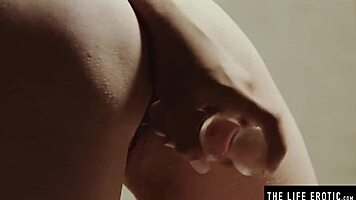 muffling her screams with a ballgag while she dildos her wet pussy!