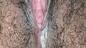 Desi housewife moans loud during close-up hairy pussy worship. Tight Asian solo action!