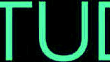 Redhead in latex gives footjob joi with natural tits