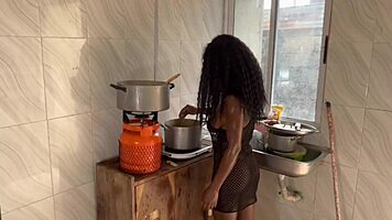 Passionate newlyweds share intimate kitchen moments