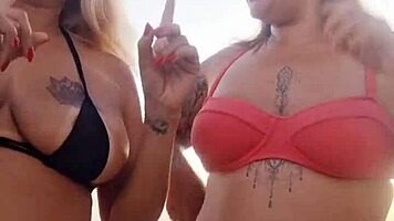 Talking dirty at the beach with my naughty friend, then we took a newbie’s virginity lol 😈