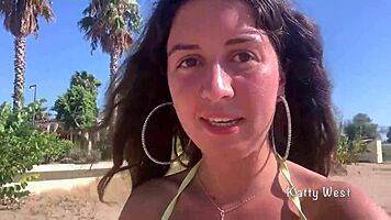 Look at this crazy girl peeing in her panties on the beach!