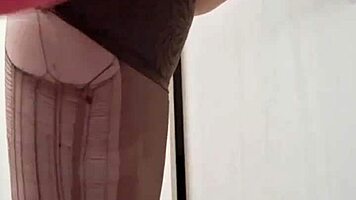 Watch Mistress Elza Kom dominate with ponytail and ripped clothes! Feel the BDSM heat as she sniffs panties!