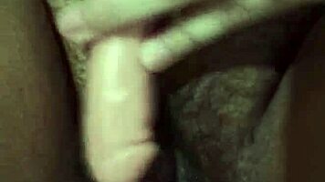 Teen 18+ virgin rubs pussy with dildo, can't let it enter. She's masturbating solo.