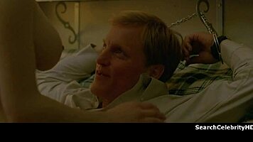 alexandra daddario strips naked on the sofa, gets handcuffed in bondage scene.