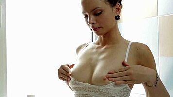 Antoinette's hot dildo play in the bath.