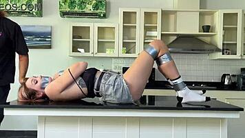 bound and teased on the countertop of desire