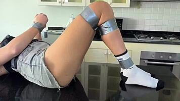 bound and teased on the countertop of desire