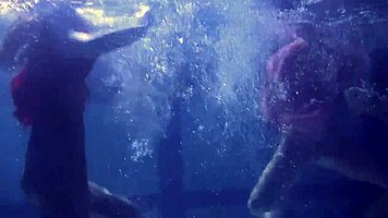 Lilia Mihalkova and Natalia Kupalka dive into intense underwater lesbian action