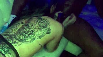 Tatted Vixen Gags On Two Big Black Cocks!