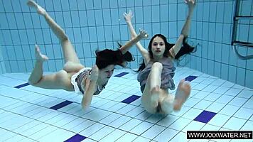 I watch shaved brunette with big tits bathing in shower