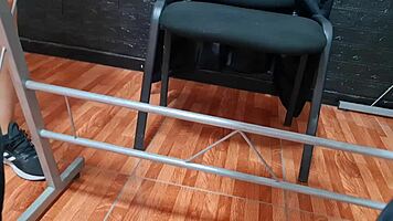 The risky spy camera captures beautiful secretary Nataly in upskirt shots at the university faculty.