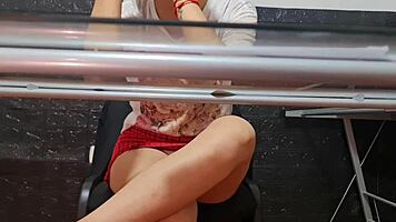 The risky spy camera captures beautiful secretary Nataly in upskirt shots at the university faculty.