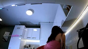 Hottest Redhead Tattooed Cheerleader With Over Knee Socks Shows Her See Through Panties In The Kitchen