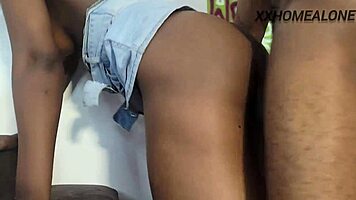 This pretty ebony girl in a tight jean mini skirt bends over the chair for intense doggystyle backshots from her friend.