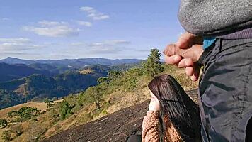 Tourist guide reveals his big cock to the pretty visitor on the mountain.
